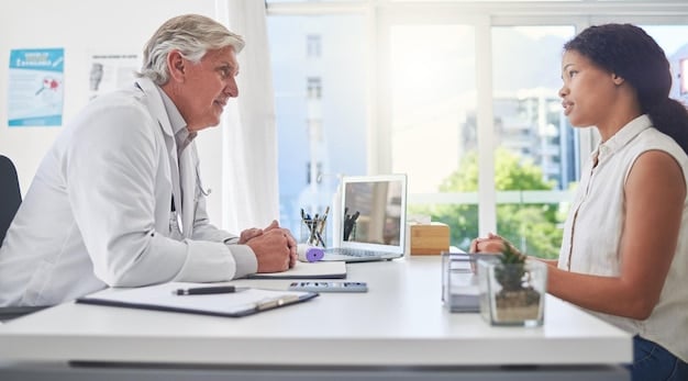 A doctor explaining a medical report to a patient in a bright, modern clinic.