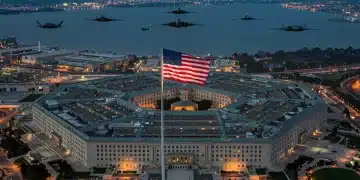 Pentagon building with American flag and military aircraft in the background, symbolizing the FY2025 defense budget